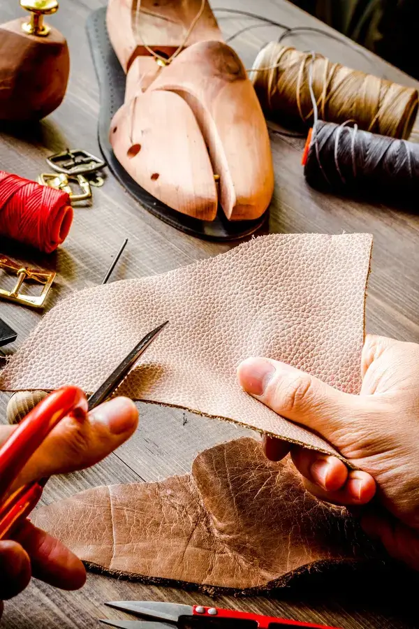 Close up of cobbler tools on a workbench